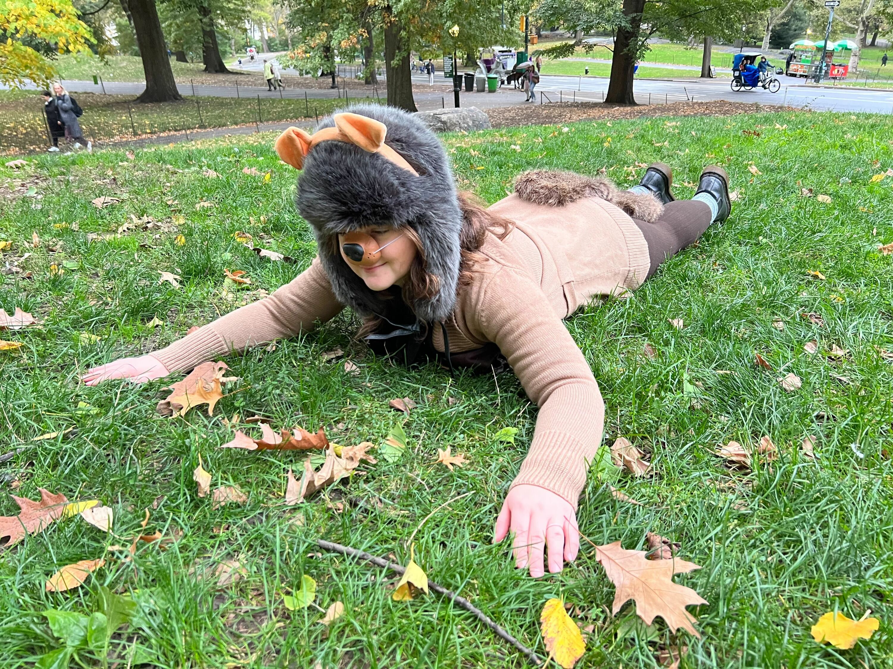 A woman dressed up as a squirrel poses in Central Park.