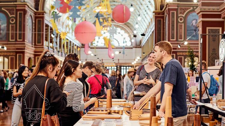 People exploring stalls at the Big Design Market.