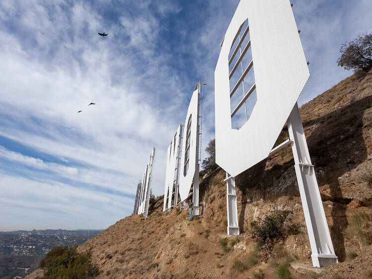 The century-old Hollywood Sign looks a lot cleaner after its once-a-decade paint job