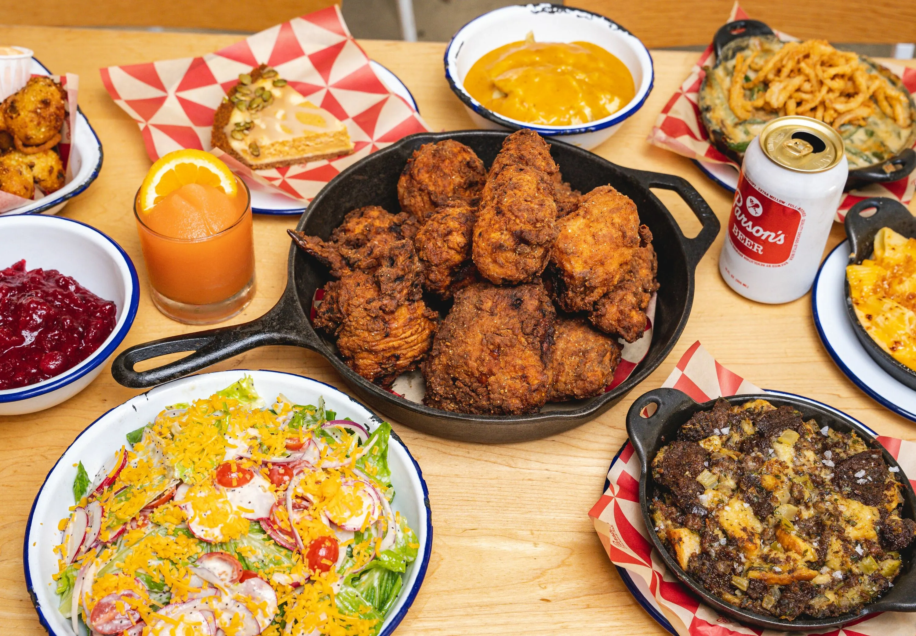 A variety of dishes and drinks on a table.