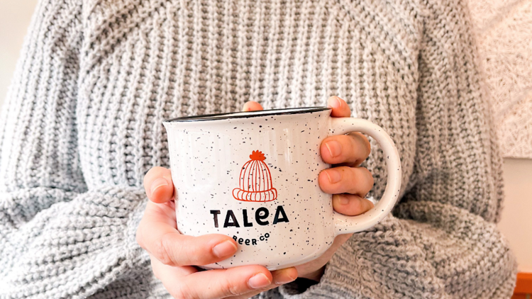 A TALEA Beer Co. mug.