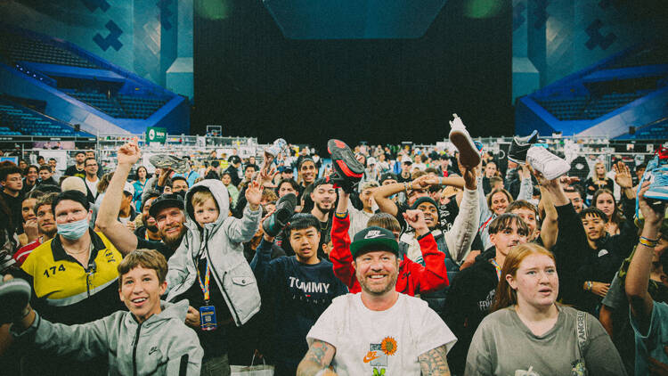 A group of people at a sneaker convention.