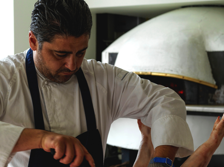 Orazio D'Elia butchering a pig