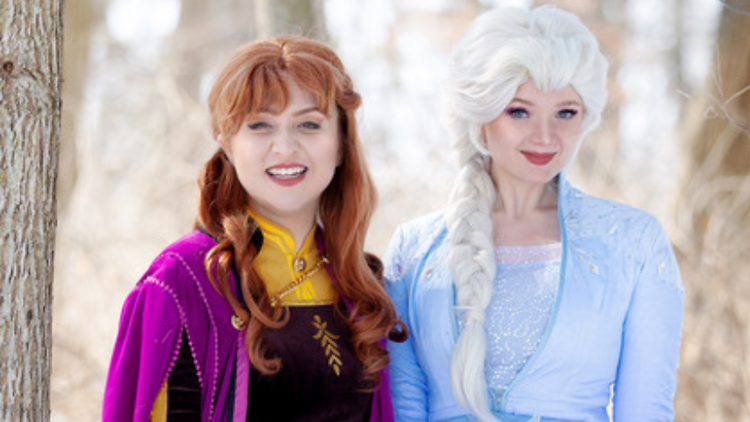 Women dressed as Elsa and Anna from Frozen