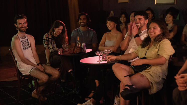 Audience members laugh during a performance of FOC IT UP.