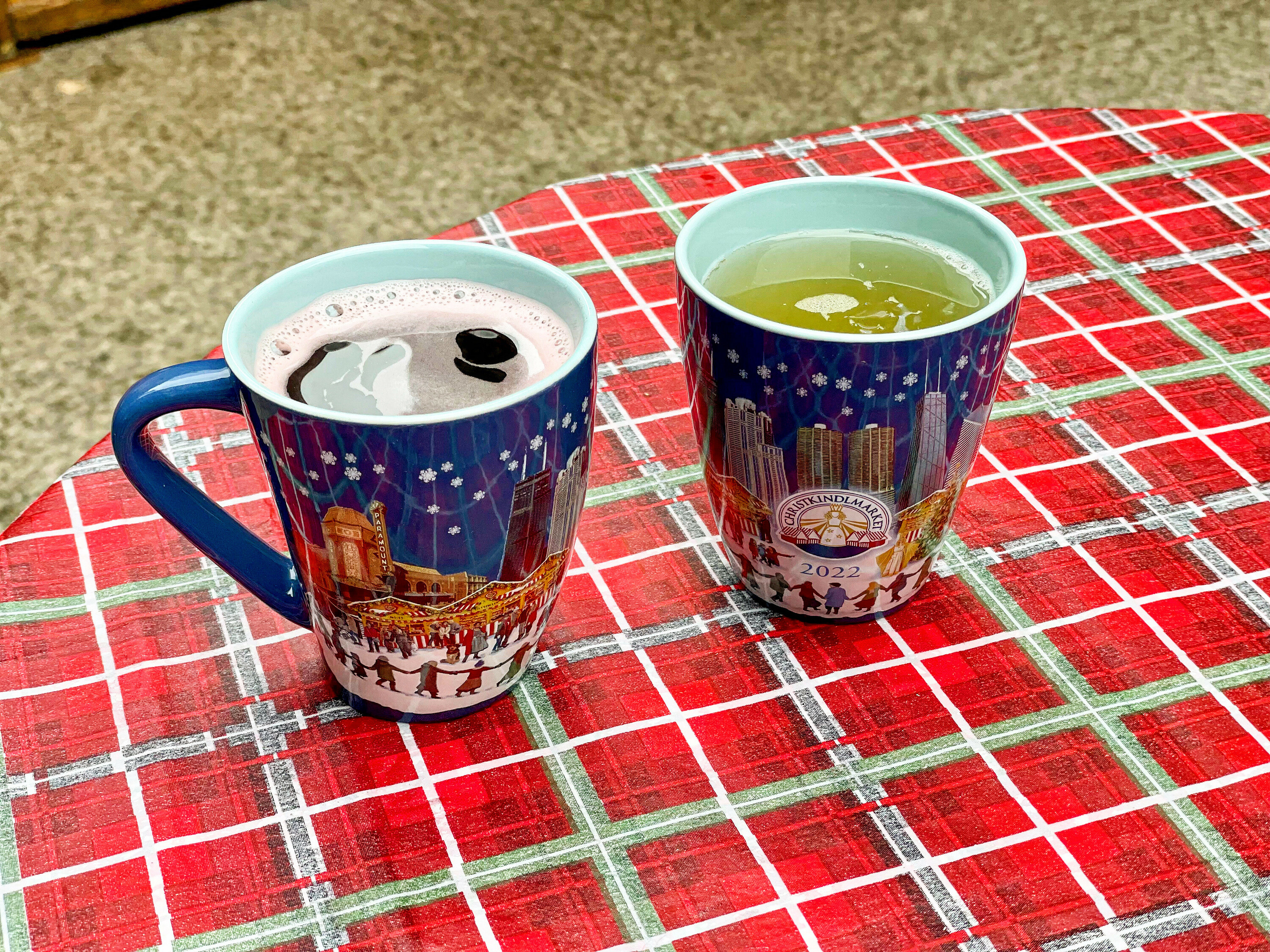 Two Christkindlmarket mugs of gluhwein.