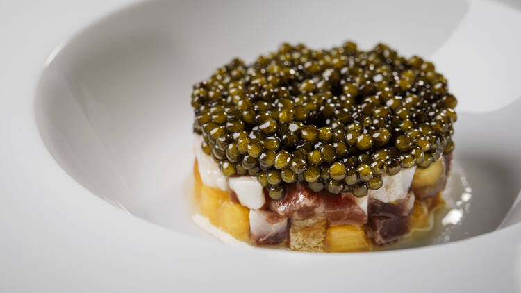 Second course: caviar, crème fraîche, persimmon relish, Iberico ham