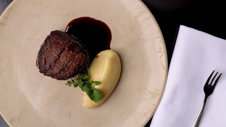 A superb piece of steak on a plate