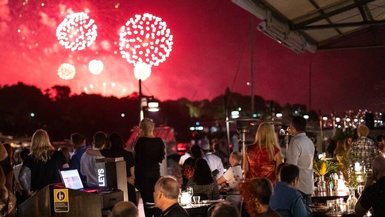 A view of fireworks from a restaurant