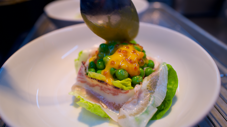 Petit pois à la Française with egg yolk, trout roe, lettuce and black pig ham