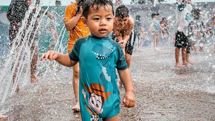 Cool down at a water play park