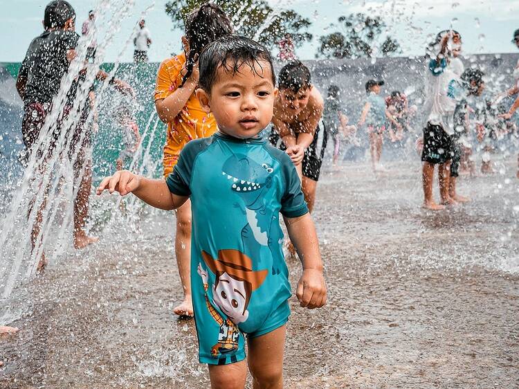 Cool down at a water play park