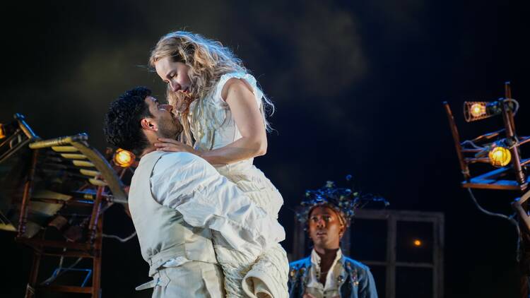 Two actors embrace as Catherine and Heathcliff in Wuthering Heights