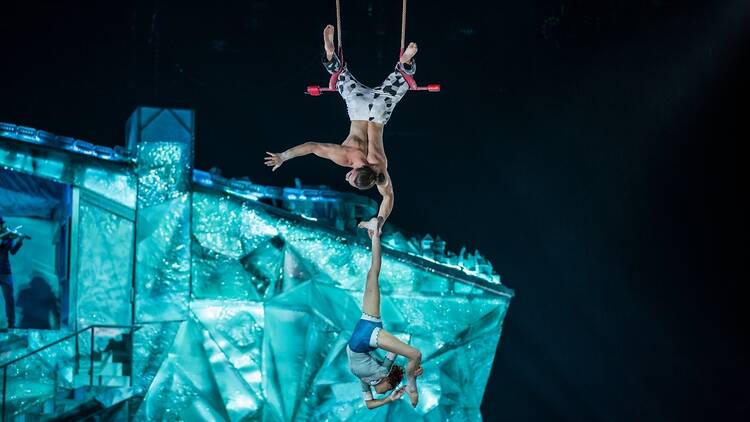 Two performers hang by a rope in Cirque du Soleil, Crystal