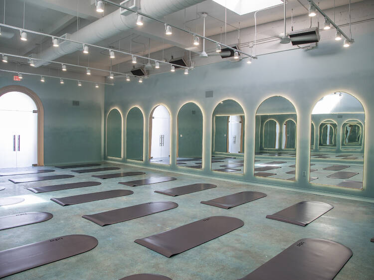 Premium Photo  Peaceful yoga studio interior with soft lighting
