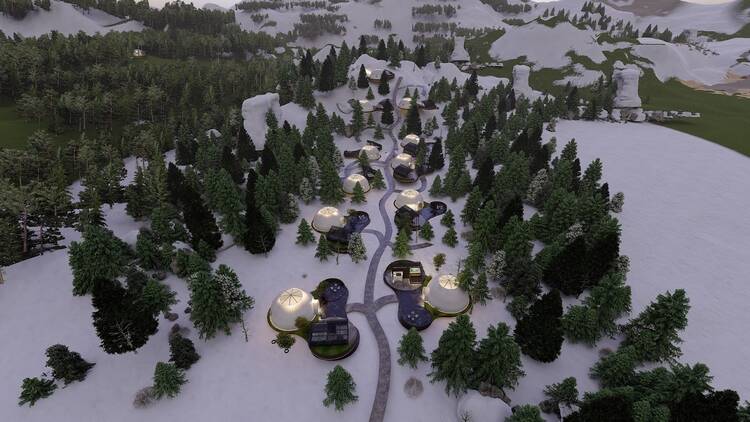 This rendering shows a drone view of about 10 domes at twilight, glowing amidst the evergreen trees ion a snowy mountaintop.