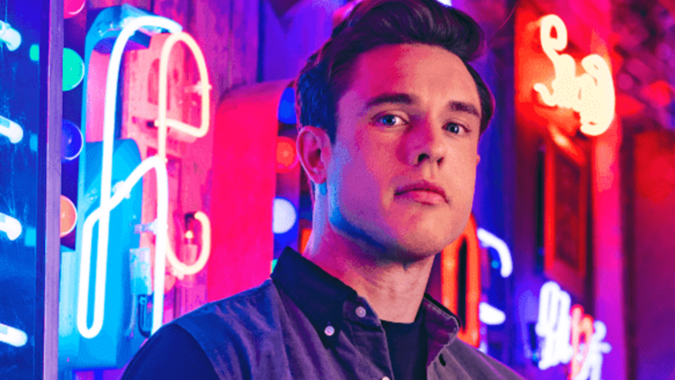 picture of comedian ed gamble near bright lights 