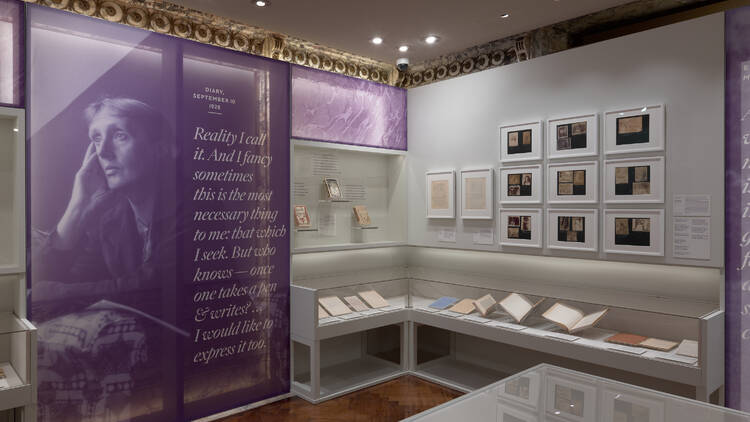  Virginia Woolf Exhibition with a purple panel showing the author's photo.