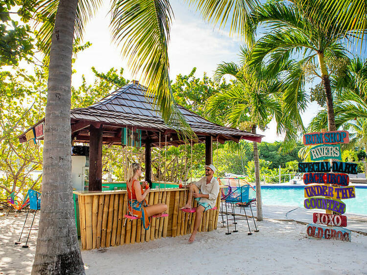 Stay at family-run True Blue Bay Boutique Resort