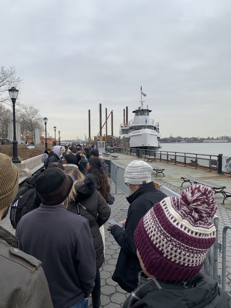 in line for the statue of liberty