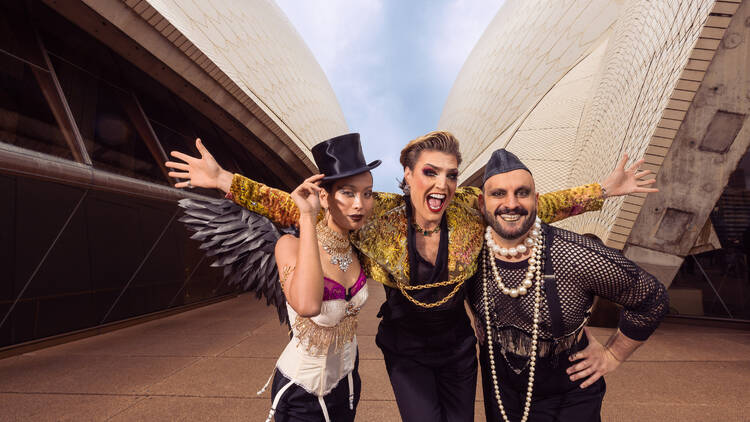 Three drag performers from Opera up Late in front of the Opera House