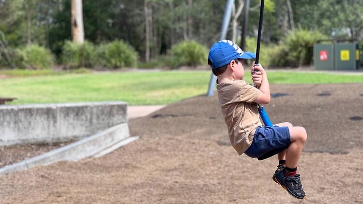 A child on a flying fox