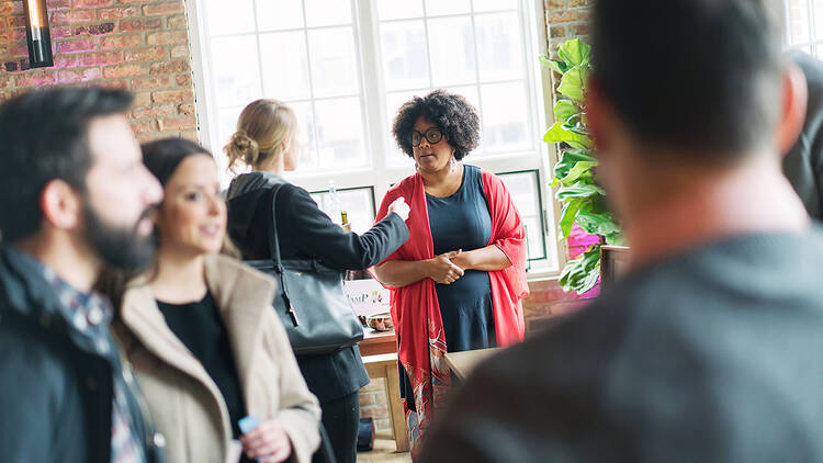 People chatting inside a store.