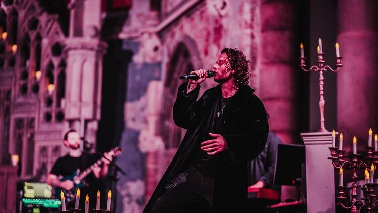 A singer performing in Queen by Candlelight Candlelight