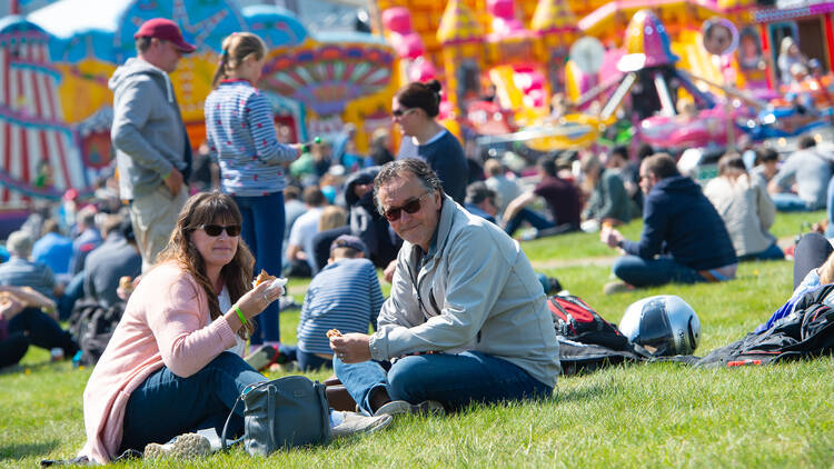 A couple enjoying lunch at Fully Charged Live Australia