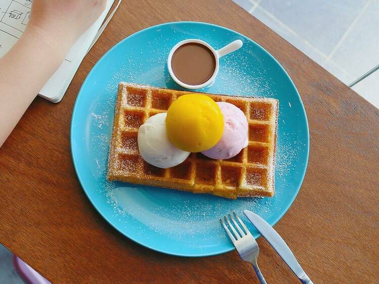 Udders Ice Cream has a $1 waffle promotion when it’s raining outside