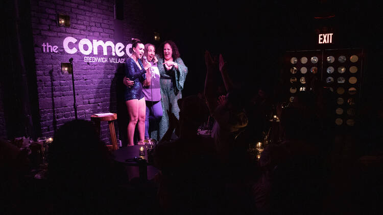 Three performers on stage for The Boss Bitch Show 