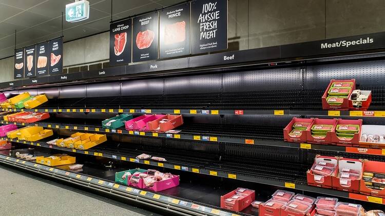 Empty shelves of meat products at Aldi.