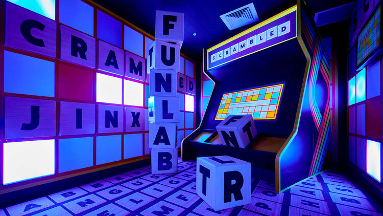 A room in Hijinx Hotel with big cubes with letters on it