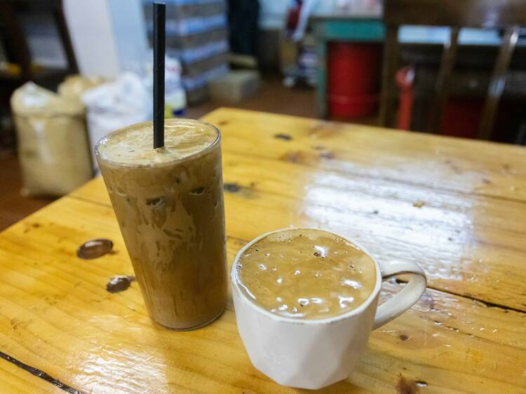 Enjoy hand-beaten coffee in Hon Kee Café