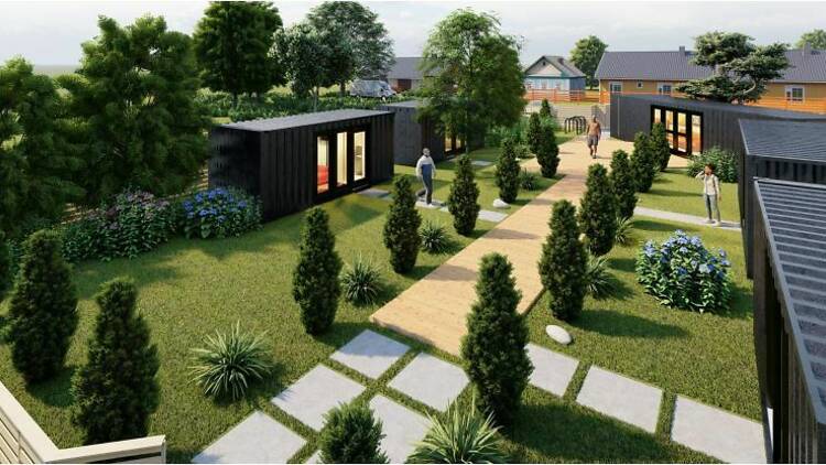 Rendering of planned campus shows a green space with shipping container suites parked around its edges, connected with a walkway lined with trees