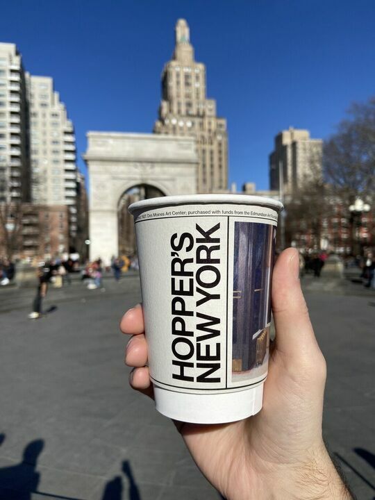 The Edward Hopper Coffee Cup in front of the Washington Square Park arch