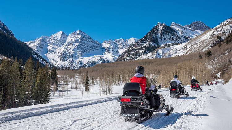 Snowmobiling in Aspen, Colorado.