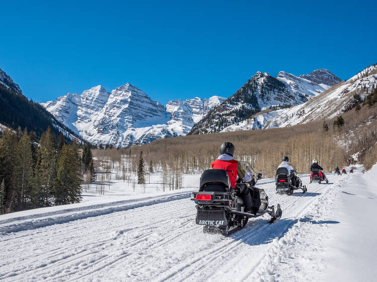 Snowmobiling in Aspen, Colorado.