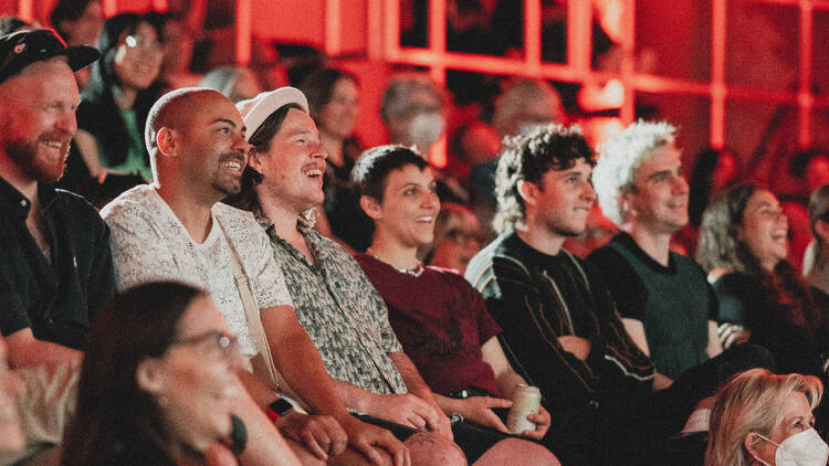 Audience members enjoying show