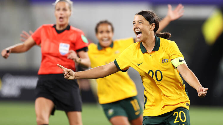 Sam Kerr celebrates after scoring a goal for the Matildas football team against Brazil.