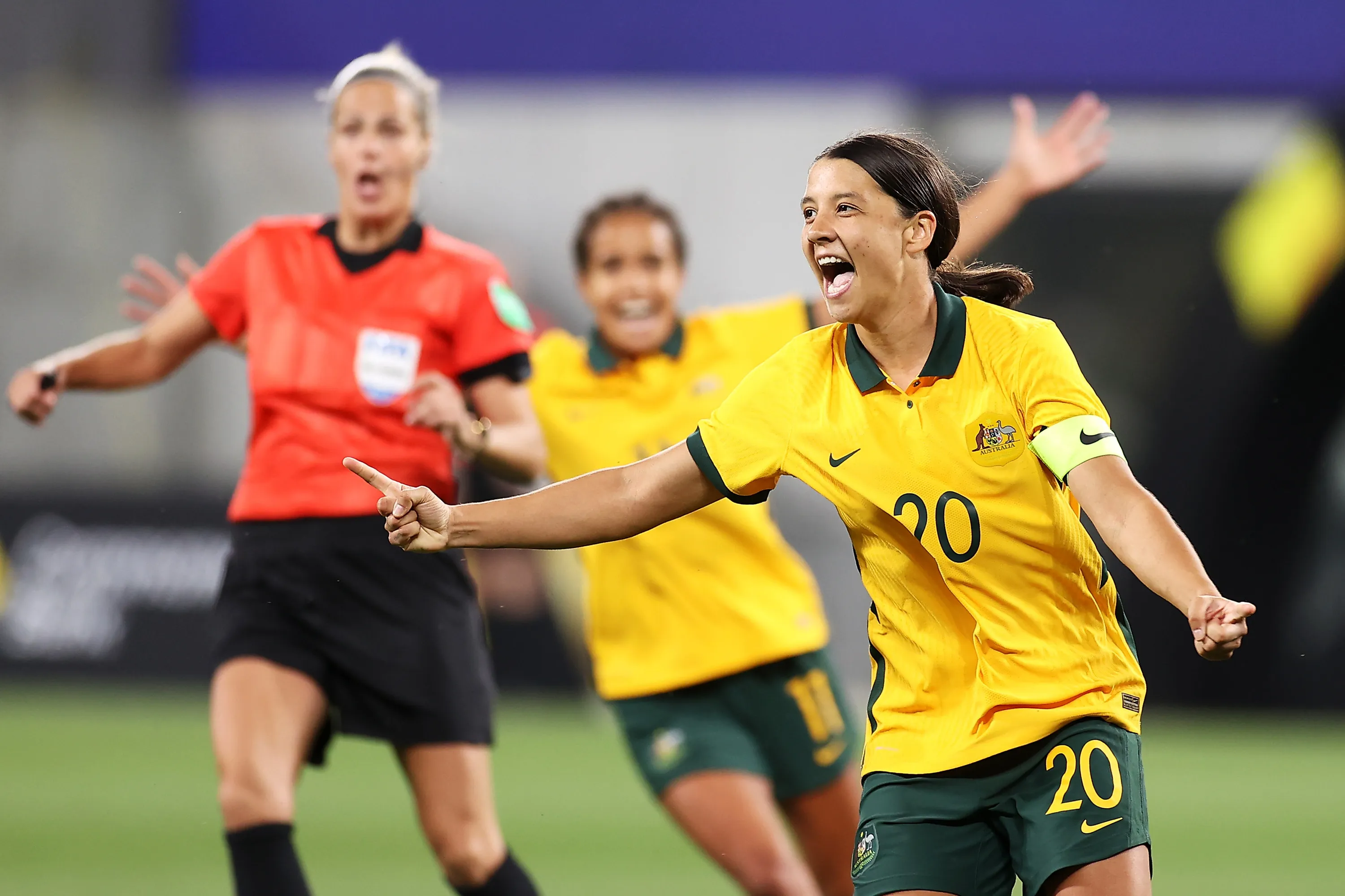 Sam Kerr celebrates after scoring a goal for the Matildas football team against Brazil.