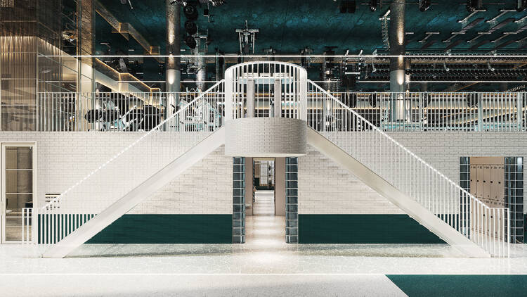 A huge double white staircase.