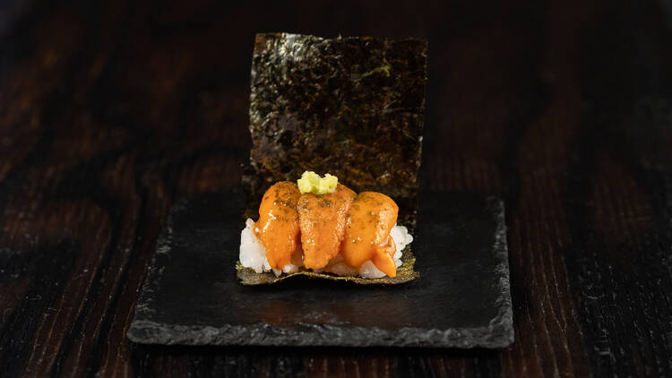 Uni and rice wrapped in nori.