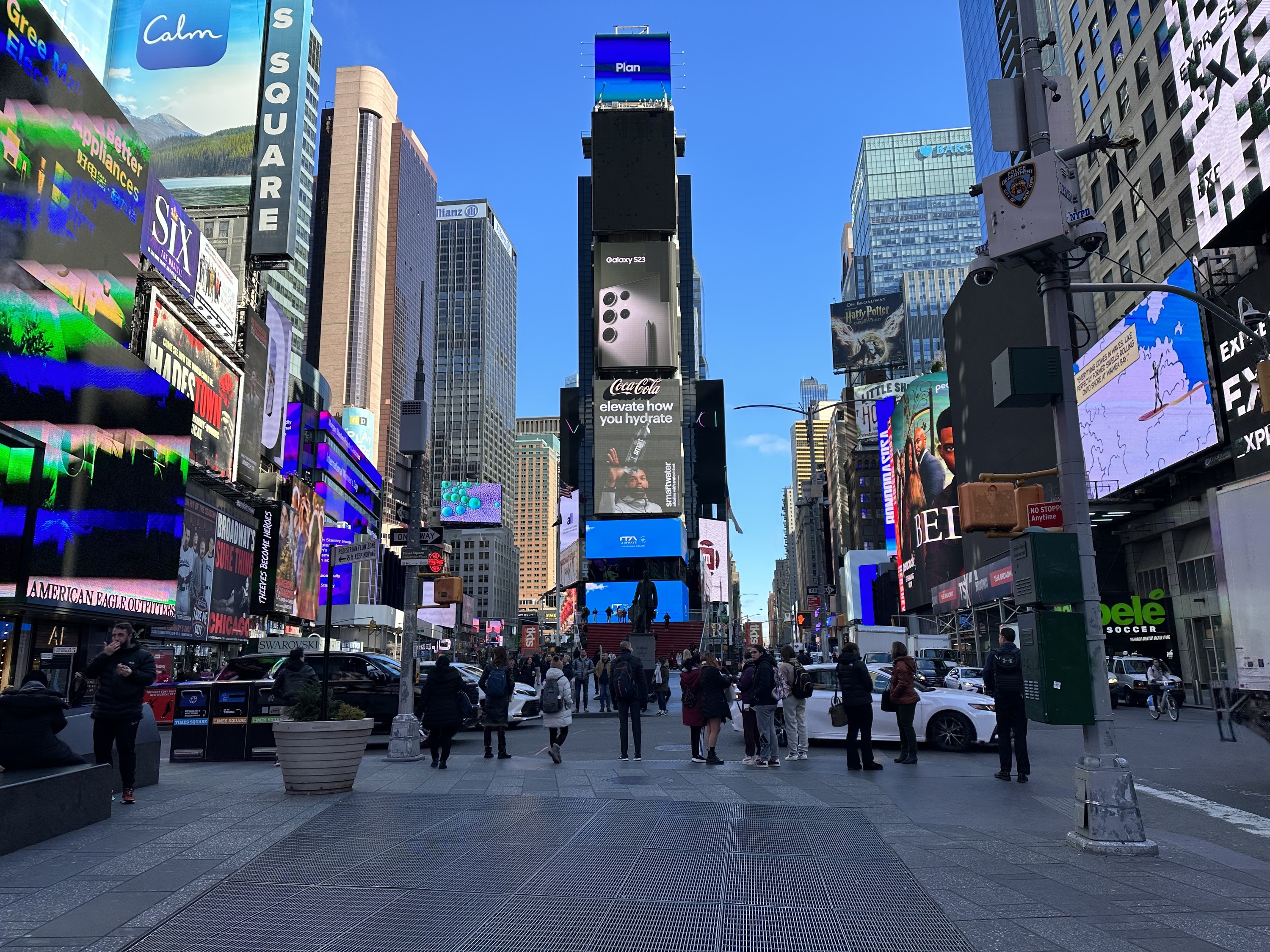 A photo of Times Square with a gate clearly visible.