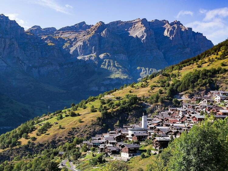 A stunning Swiss mountain village is offering people £50,000 to move there