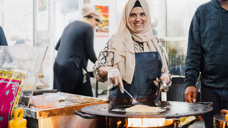 A woman cooking at Ramadan Nights Lakemba