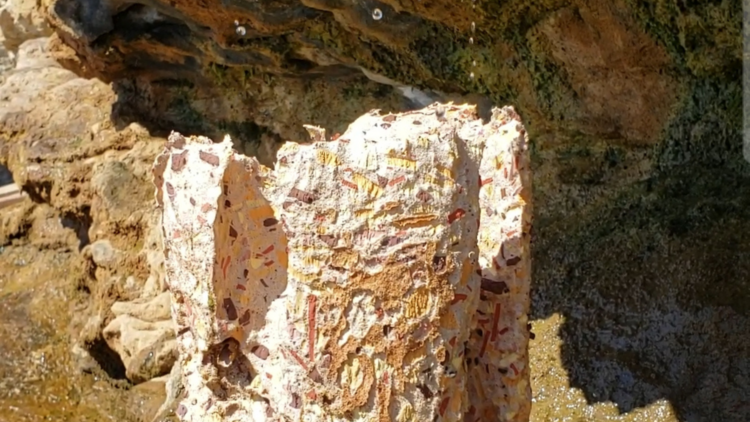 A sculpture is eroded under natural sandstone