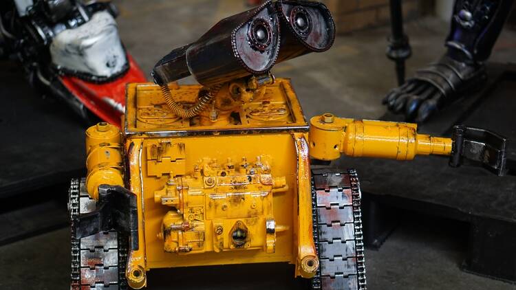 A WALL-E sculpture made from scrap metal