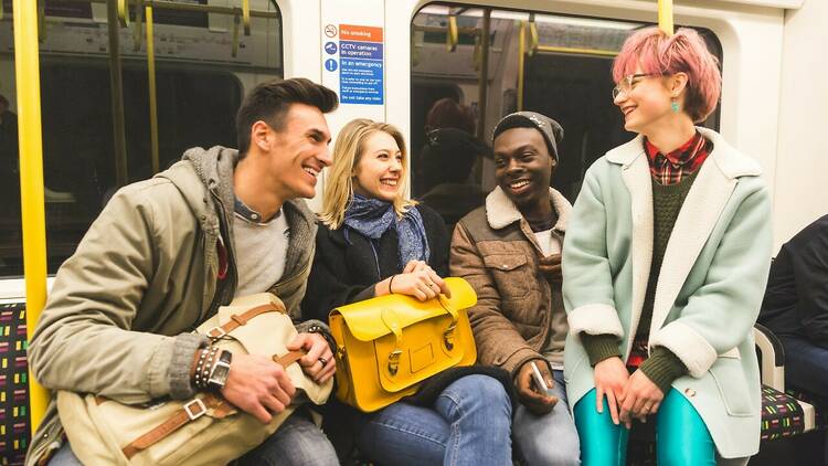 People having fun on the London underground