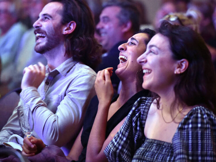 picture of audience members laughing